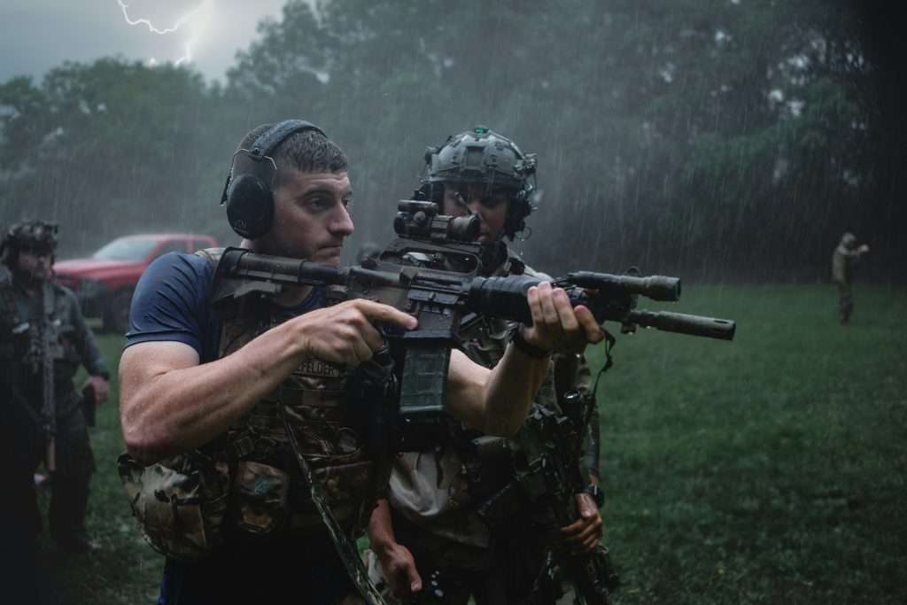 Tactical operators training in the rain.