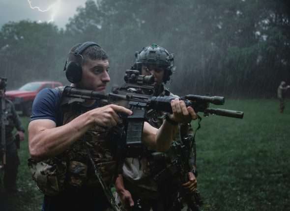 Tactical operators training in the rain.