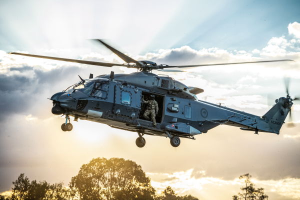 A helicopter hovering in the sky.