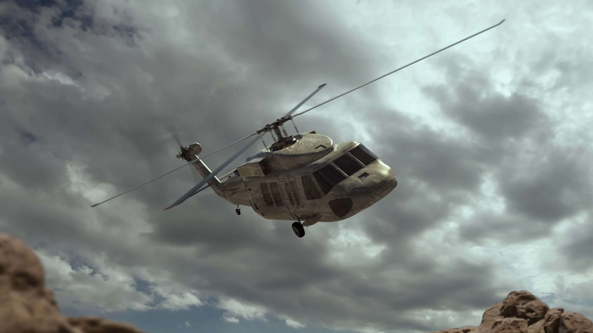 A helicopter flying under a cloudy sky.